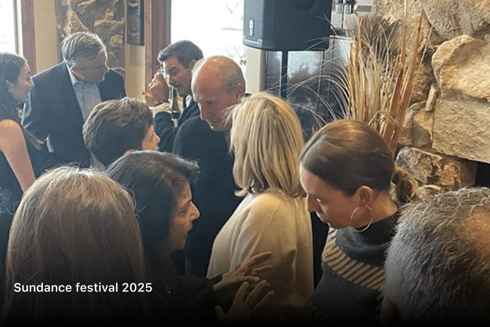Guests in conversation at a Sundance Festival 2025 reception